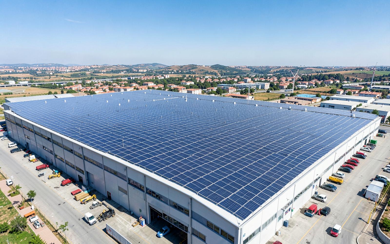 Industrial warehouse roof fully covered with photovoltaic panels